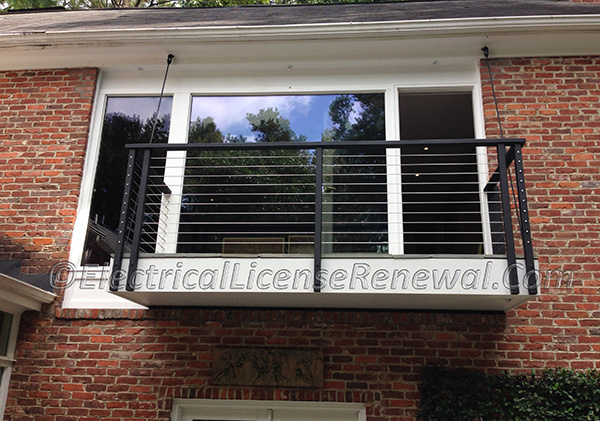 The balcony requires a receptacle since it is attached to and accessible from inside the dwelling. The receptacle is no longer required to be located physically within the perimeter.