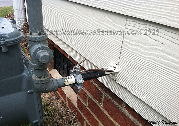 NEC 250.8 requires a listed clamp when bonding the gas piping system.