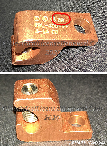 Some grounding and bonding fittings that are listed for use in wet and corrosive environments are marked “direct burial” or “DB” as in the image.