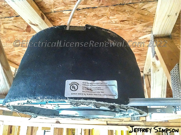 When installing a recessed luminaire into a rated ceiling, one option is to use a luminaire enclosure that is listed for use in a fire resistance–rated construction.