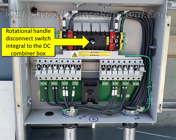 Even though the DC combiner box has the required disconnect, there is still another code violation. Can you spot it? This is an ungrounded PV system which is easily spotted because of the number of fuse holders. White conductor marking is only allowed on grounded conductors.