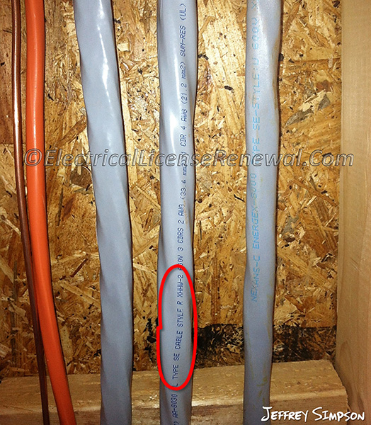 This 2 AWG aluminum Type SE cable has XHHW-2 (90°C) conductor insulation and is installed in an exterior wall that will be insulated after rough inspection is passed. The cable is fed from a breaker with 75°C rated terminals and supplies an apartment unit subpanel that has 75°C rated main lug terminals.
