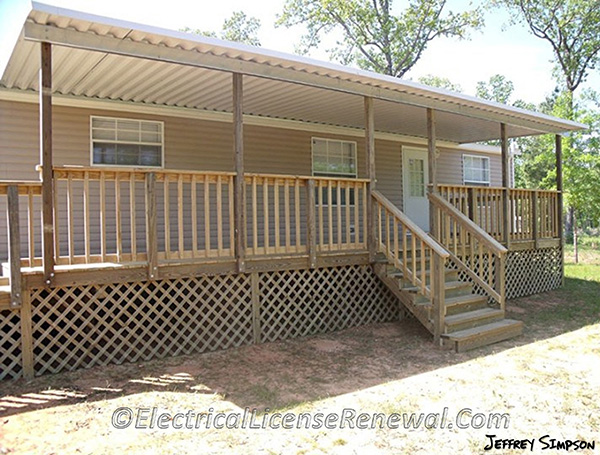 Where outdoor or under-chassis line-voltage (120 volts, nominal, or higher) wiring is exposed, it shall be protected by a conduit or raceway identified for use in wet locations. The big question is what is considered exposed? Is the wiring under the home behind the trellis skirting in the image still exposed?