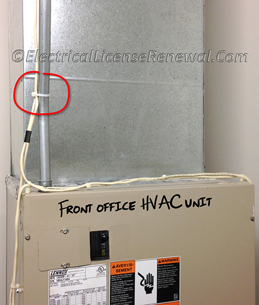 These Class 2 control cables are permitted to be strapped to the power circuit supply conduit since both the cables and the conduit are associated with the HVAC unit.